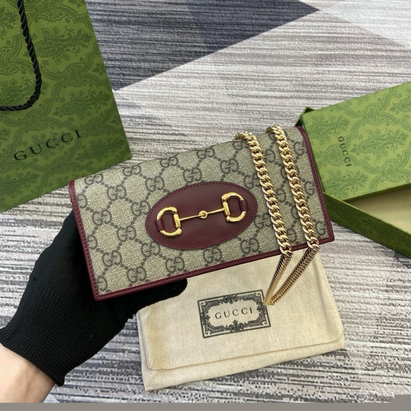 G*u*i satchel bags
